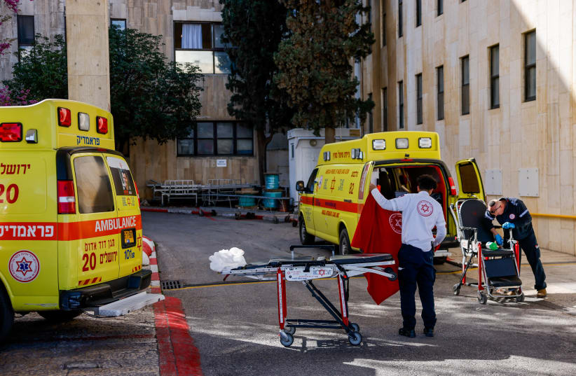  Medical teams near the ambulances that brought the wounded citizens from the terror attack in the Jordan Valley, March 28, 2024 (photo credit: CHAIM GOLDBEG/FLASH90)