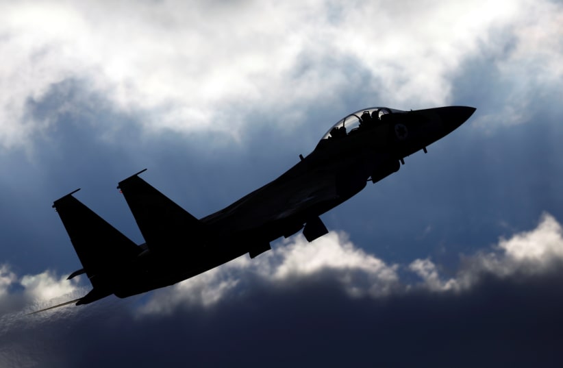  An Israeli Air Force F-15 fighter jet flies during an aerial demonstration at a graduation ceremony for Israeli air force pilots at the Hatzerim air base in southern Israel December 29, 2016. (photo credit: AMIR COHEN/REUTERS)