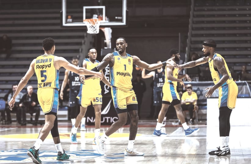 MACCABI TEL AVIV has been playing in almost perfect synchronicity recently in the Euroleague, with six straight victories – including the latest, 95-80 over Valencia – and gearing up for a postseason run. (photo credit: Djorde Kostic)