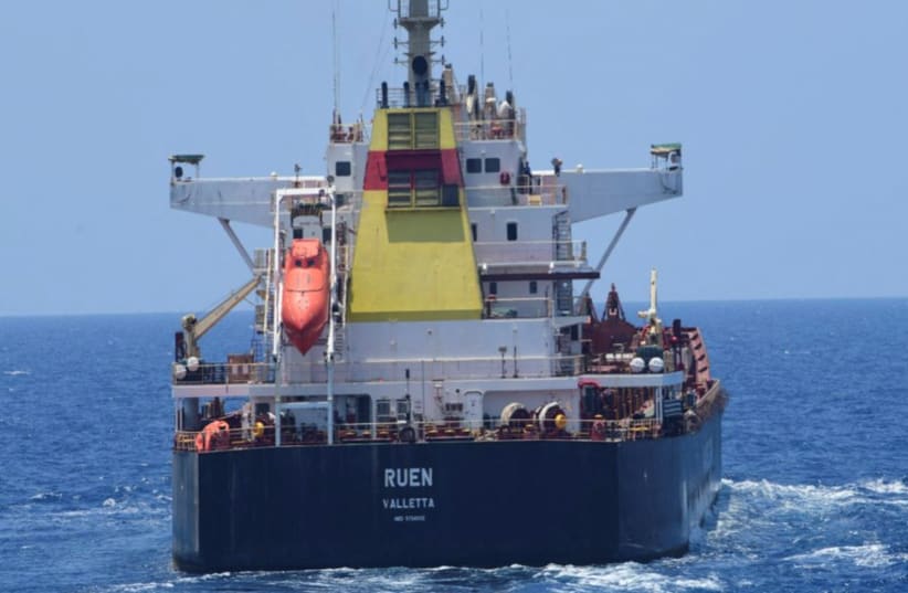 The Maltese-flagged bulk cargo vessel Ruen seized by Somali pirates, which was intercepted by the Indian Navy, is pictured at sea, in this handout photo released on March 16, 2024.  (photo credit: SpokespersonNavy via X /Handout via REUTERS)