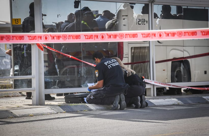  Police at the scene of a stabbing attack at the central bus station in Beersheba, southern Israel, on March 31, 2024.  (photo credit: DUDU GREENSPAN/FLASH90)