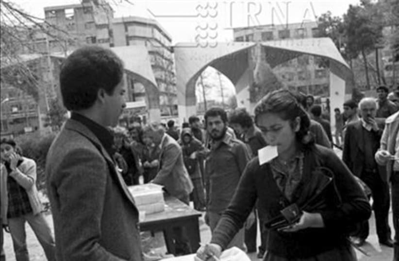  IRANIANS VOTE in the first election under Ayatollah Khomeini, on March 30, 1979.  (photo credit: US National Archives)