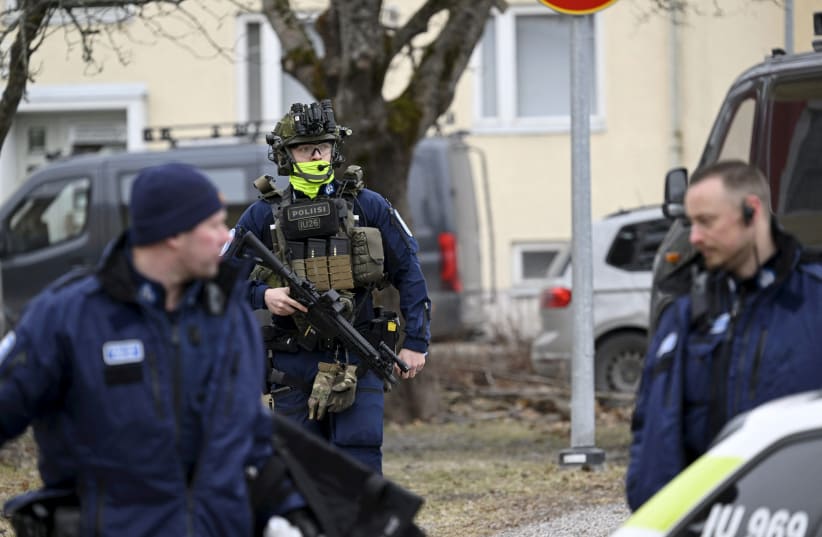  Police officers operate at the Viertola comprehensive school in Vantaa, Finland, on April 2, 2024. Three minors were injured in a shooting at the school on Tuesday morning. A suspect, also a minor, has been apprehended. (photo credit: Lehtikuva/Markku Ulander via REUTERS.)