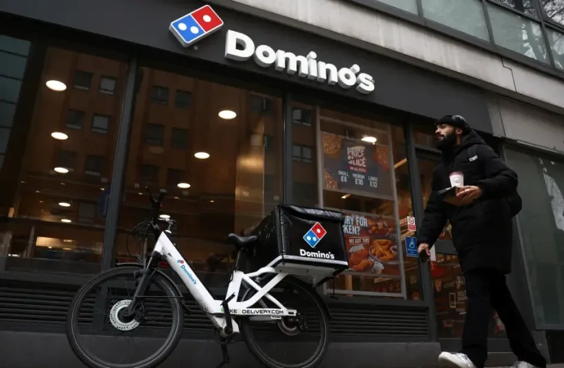  Domino's Pizza  (photo credit: REUTERS/HENRY NICHOLLS)