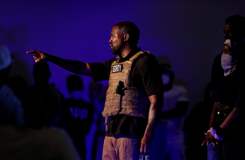  Rapper Kanye West calls for a question from the crowd as he holds his first rally in support of his presidential bid in North Charleston, South Carolina, U.S. July 19, 2020.  (photo credit: RANDALL HILL/REUTERS)