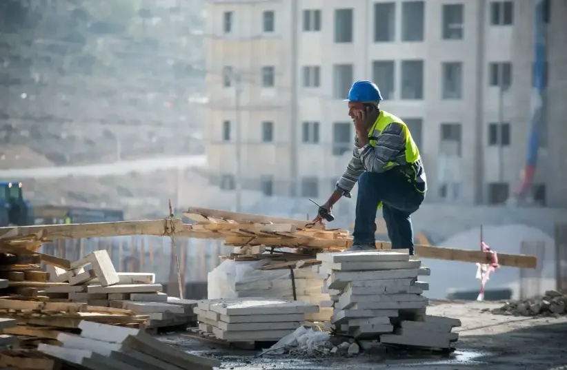  Palestinian construction worker. (photo credit: YOTAM RONEN)
