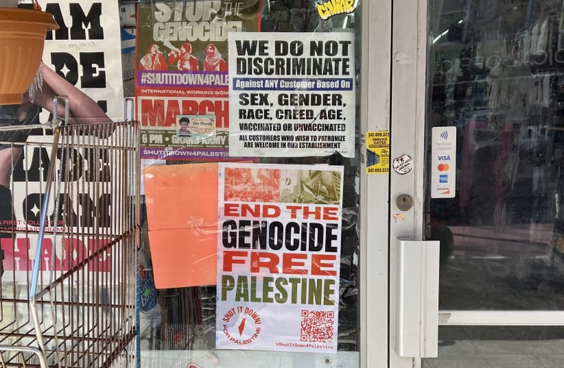 ‘FREE PALESTINE’ poster on a Brooklyn storefront. (photo credit: BRIAN BLUM)
