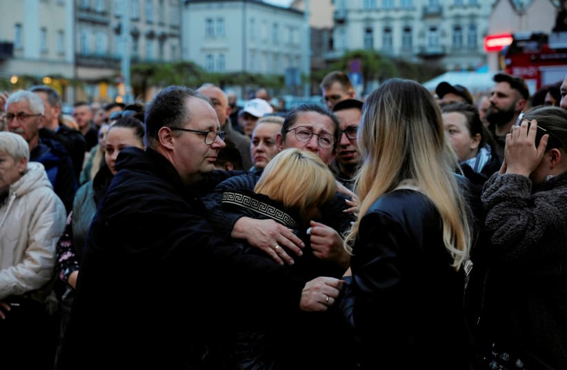  Mourners gather to hold a vigil for the Polish aid worker Damian Sobol who was killed by the Israeli army in Gaza, among seven people working for the charity World Central Kitchen (WCK) who were killed in an Israeli airstrike, in Przemysl, Poland, April 4, 2024. (photo credit: Patryk Ogorzalek/ Agencja Wyborcza.pl via REUTERS)