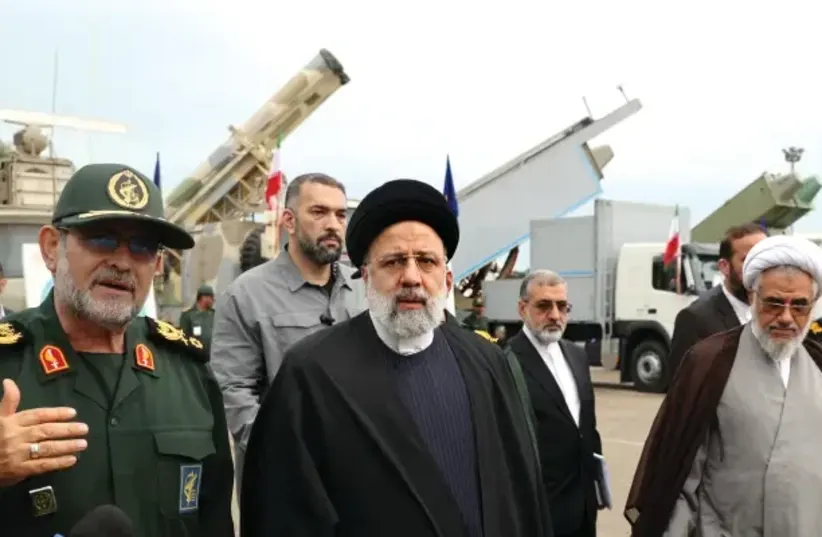  Iranian President Ebrahim Raisi tours the base of the Revolutionary Guards  (photo credit: REUTERS)