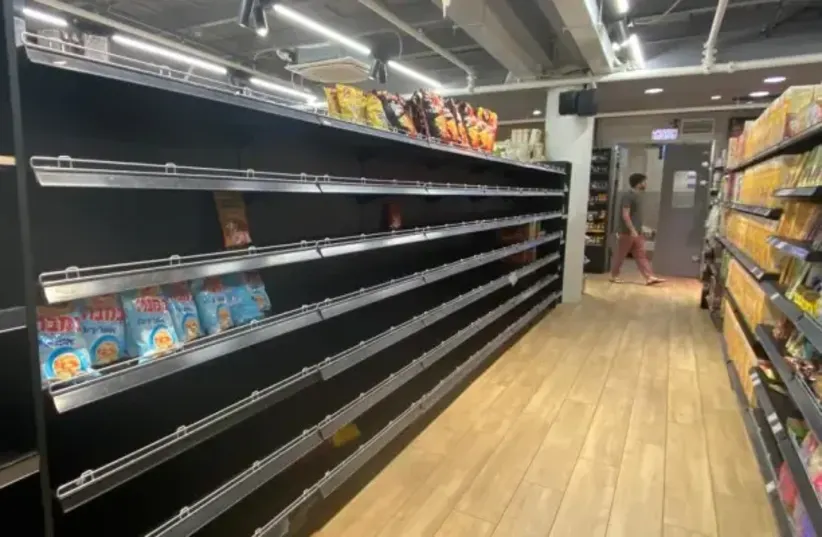  Empty shelves in stores in Israel  (photo credit: AVSHALOM SASSONI)