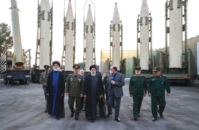 Iran's President Raisi inspects ballistic missiles (photo credit: REUTERS)