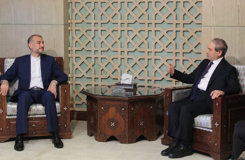  Syrian Foreign Minister Faisal Mekdad meets with his Iranian counterpart Hossein Amirabdollahian at the Foreign Ministry in Damascus, Syria April 8, 2024.  (photo credit: REUTERS/FIRAS MAKDESI)