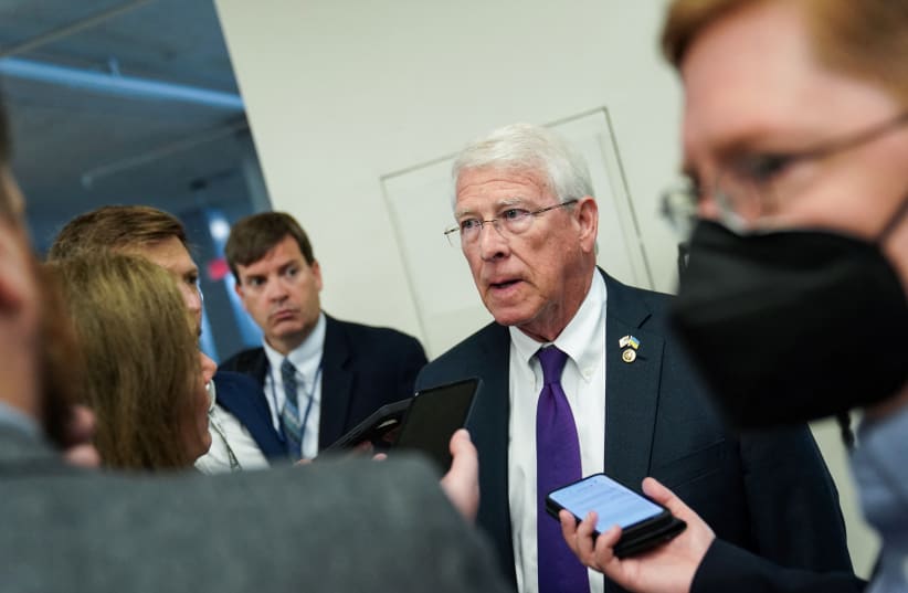 U.S. Senator Roger Wicker (R-MS) speaks to members of the press while passing through the Senate subway at the U.S. Capitol in Washington, D.C., U.S., July 19, 2022.  (photo credit: SARAH SILBIGER/REUTERS)