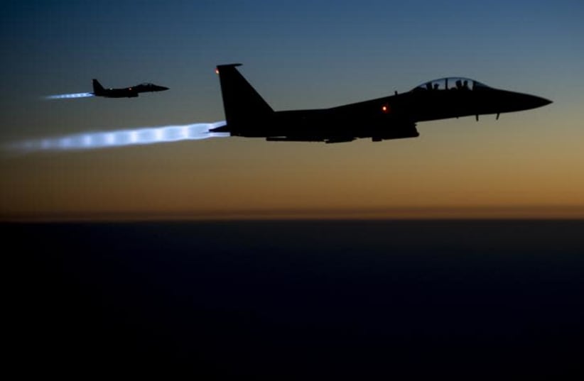 Aviones de combate F15E (photo credit: US AIR FORCE PHOTO VIA REUTERS)