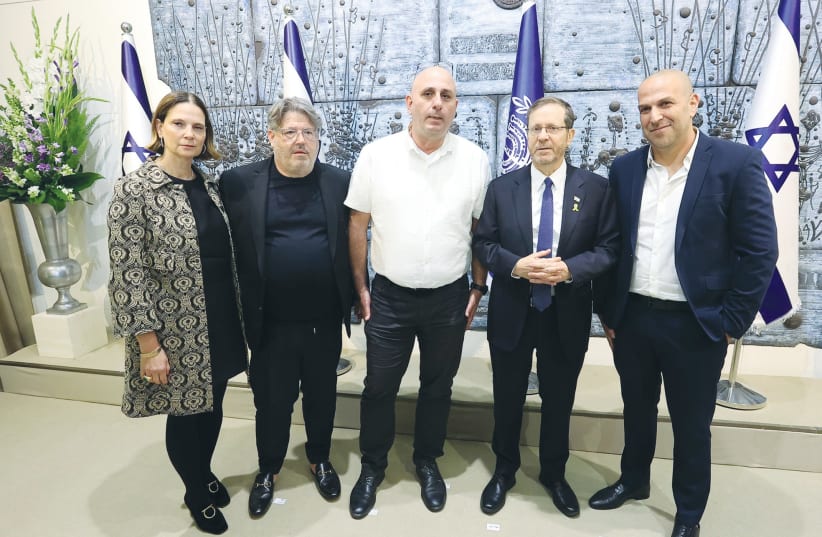  PRESIDENT ISAAC HERZOG with (from Left) Hila and Ran Rahav, Dadi Attas, and Gadi Weinreb at the 50th anniversary celebration of Alut. (photo credit: Dudi Zadeh)