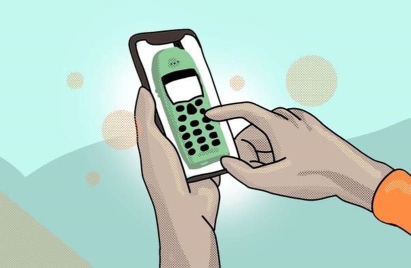 Some people avoid smartphones and instead use a dumbphone – a traditional mobile phone or a reduced-feature designer phone. (photo credit: MATTI AHLGREN/AALTO UNIVERSITY)