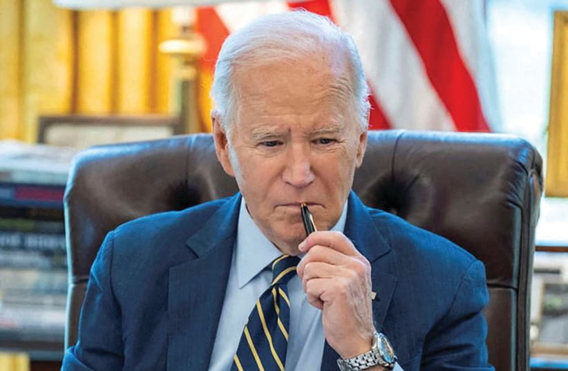  El PRESIDENTE DE EE.UU. Joe Biden habla por teléfono con el Primer Ministro Benjamin Netanyahu, la semana pasada. (photo credit: The White House/Reuters)