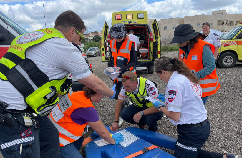 MDA paramedics lead a Magen Project drill with local volunteers to ensure vulnerable communities are equipped and prepared to administer critical care in the event that access to the area is temporarily compromised. (photo credit: AFMDA)