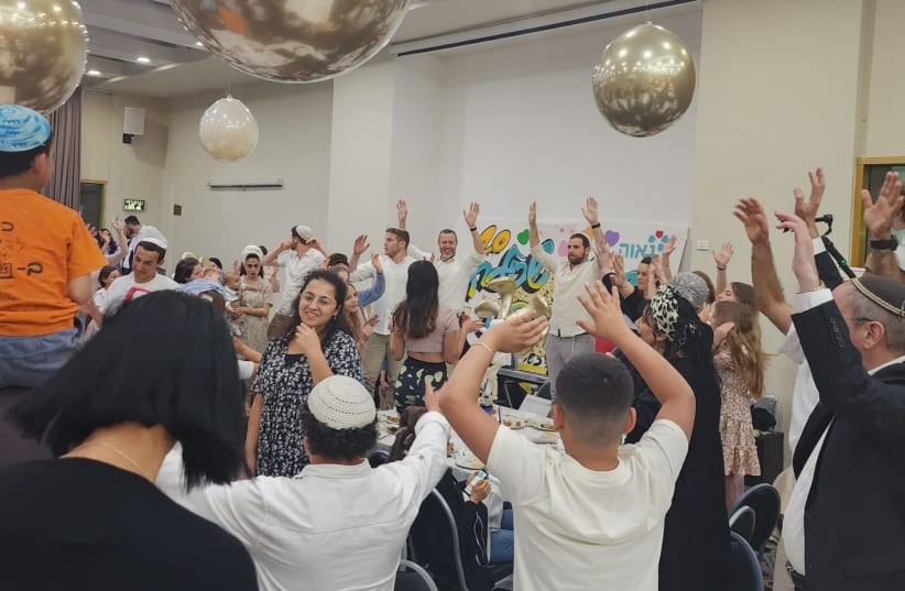  Bereaved families celebrate Passover with OneFamily in 2023.  (photo credit: Courtesy of OneFamily)