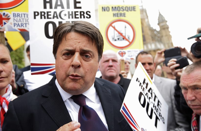 Far-right British National Party (BNP) leader Nick Griffin attends a protest against the killing of a British soldier in London June 1, 2013. Police intervened to separate about 150 far-right protesters from a much larger anti-racism crowd in London on Saturday to stop them from coming to blows over (photo credit: OLIVIA HARRIS/ REUTERS)