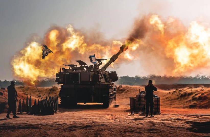  AN ISRAELI M109 howitzer fires artillery shells. (photo credit: IDF SPOKESPERSON'S UNIT)