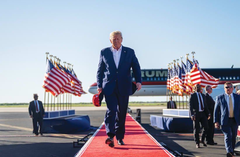  DONALD TRUMP arrives for his first 2024 presidential campaign rally at Waco Regional Airport in Texas, March 25. The rally coincided with the 30th anniversary of the Waco standoff. (photo credit: Brandon Bell/Getty Images)
