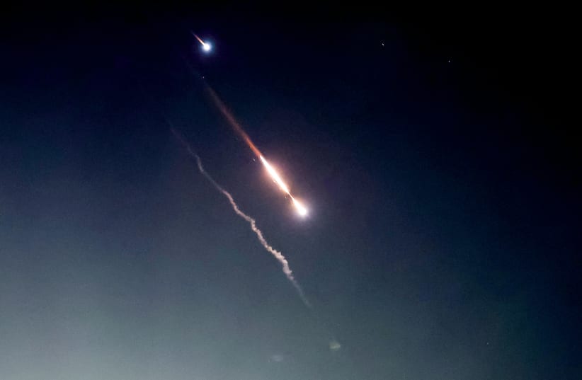  Missiles fired at Israel are seen in the sky over Amman, Jordan on April 14, 2024, in this screen grab obtained from a social media video.  (photo credit: REUTERS)