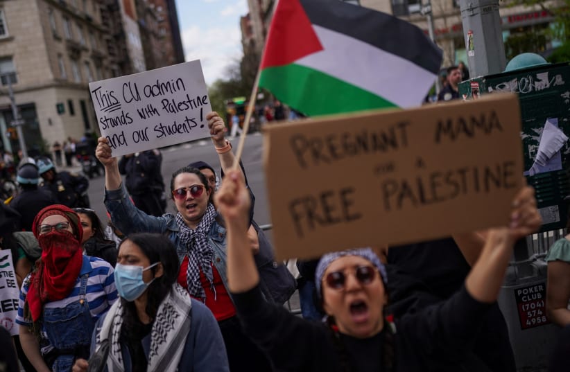  Demonstrators gather outside of Columbia University to demand a ceasefire and the end of Israeli attacks on Gaza, during the ongoing conflict between Israel and the Palestinian Islamist group Hamas, during a protest in New York, U.S., April 20, 2024.  (photo credit: Reuters/Adam Gray)