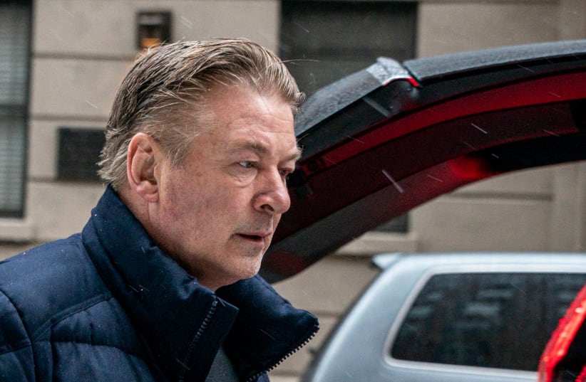  Actor Alec Baldwin departs his home, as he will be charged with involuntary manslaughter for the fatal shooting of cinematographer Halyna Hutchins on the set of the movie "Rust,” in New York, US January 31, 2023 (photo credit: REUTERS/DAVID 'DEE' DELGADO)