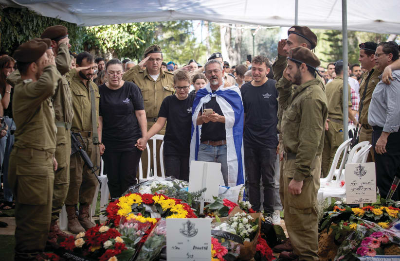  FAMILY and friends attend the funeral of Israeli soldier Shilo Har-Even on Jerusalem’s Mount Herzl,  Oct. 13, 2023.  (photo credit: OREN BEN HAKOON/FLASH90)
