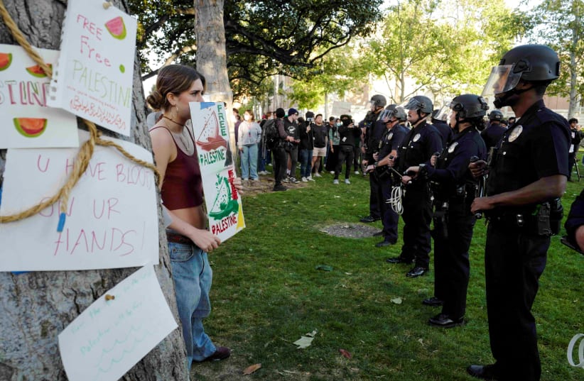  LAPD surrounds students protesting in support of Palestinians at an encampment at the University of Southern California’s Alumni Park, as the conflict between Israel and the Palestinian Islamist group Hamas continues, in Los Angeles, California, US, April 24, 2024. (photo credit: VIA REUTERS)
