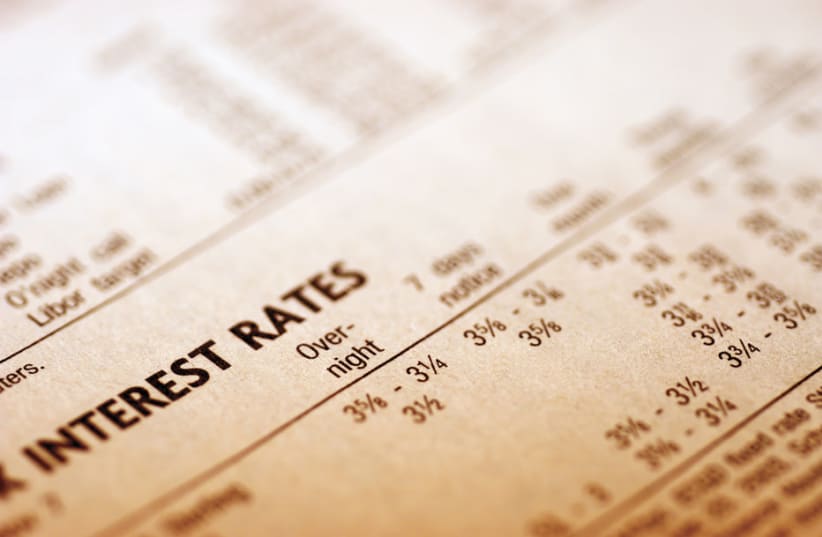  Close-up of a list showing interest rates (photo credit: INGIMAGE)