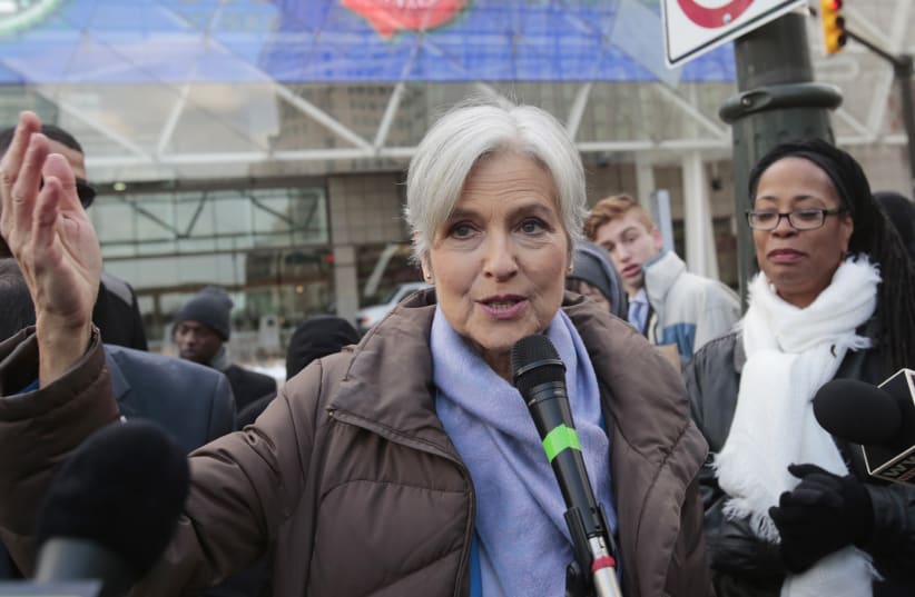  Jill Stein, 2016 Green Party candidate for U.S. president, holds a rally and protest against stopping the recount of election ballots at Cobo Center in Detroit, Michigan December 10, 2016. (photo credit: REBECCA COOK/REUTERS)