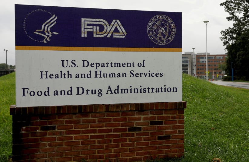  Signage is seen outside of the Food and Drug Administration (FDA) headquarters in White Oak, Maryland, U.S., August 29, 2020 (photo credit: ANDREW KELLY / REUTERS)