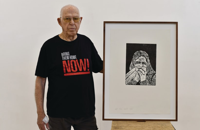  YEHUDA GRANIT with one of  his works from  ‘The War is Getting Excited.’ Uploaded on 1/5/2024 (photo credit: Rutie Stern)