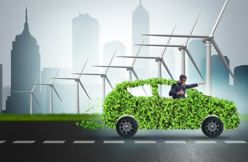  Electric car concept with windmills (illustrative) (photo credit: INGIMAGE)