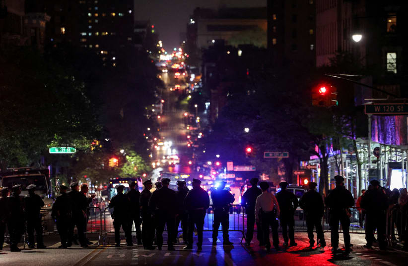  NYPD law enforcement officials hold a perimeter of closed streets surrounding Columbia University anti-Israel encampment (photo credit: REUTERS/CAITLIN OCHS/FILE PHOTO)