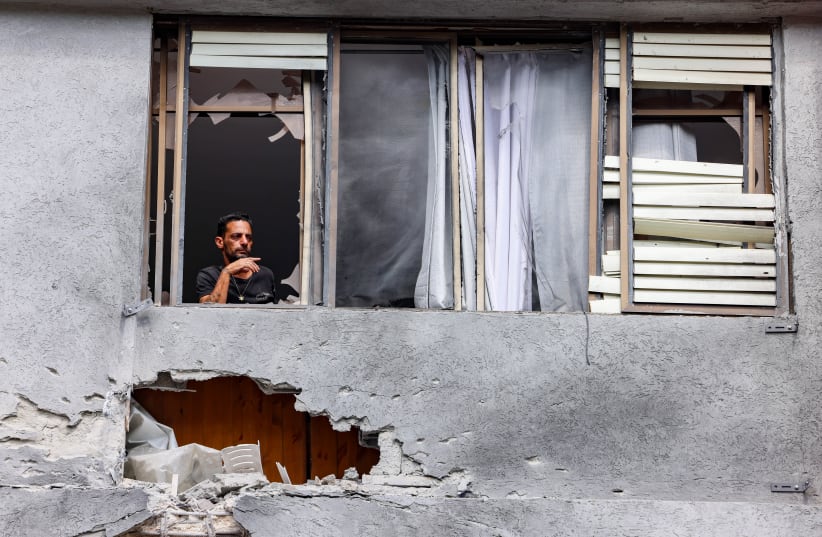  A building hit by rocket fire in Kiryat Shmona. May 5, 2024 (photo credit: David Cohen/Flash90)
