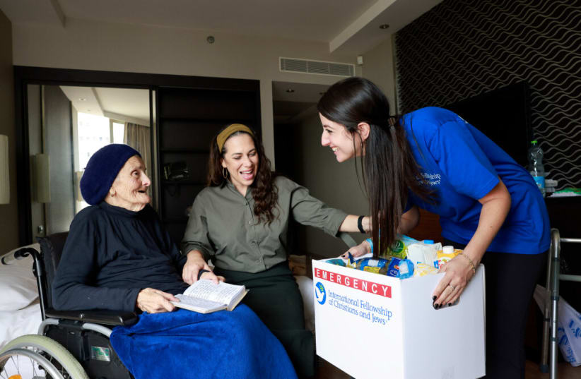  Tamar Yifrach, a 'With Dignity and Fellowship' beneficiary from the city of Netivot is visited by Yael Eckstein. (photo credit: CHEN SCHIMMEL)