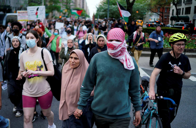 Pro-Palestinian demonstrators attend a protest near the Met Gala, an annual fundraising gala held for the benefit of the Metropolitan Museum of Art's Costume Institute with this year's theme 'Sleeping Beauties: Reawakening Fashion' in New York City, New York, U.S., May 6, 2024. (photo credit: Eduardo Munoz/Reuters)