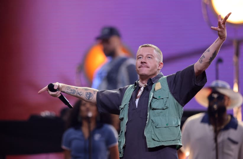  Rapper Macklemore performs during the opening ceremony of the Invictus Games, in Duesseldorf, Germany, September 9, 2023. (photo credit: REUTERS/THILO SCHMUELGEN)