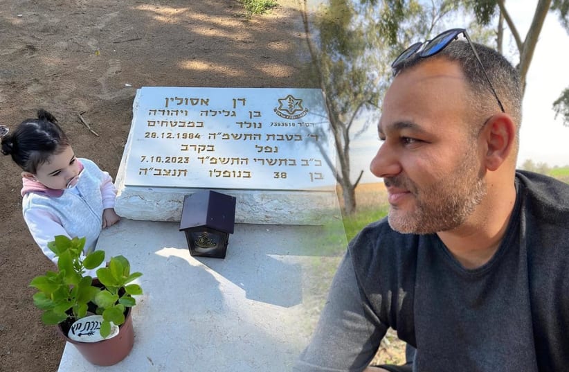  In the image, the picture Dan Asulin (right) and his young daughter visiting his grave.  (photo credit: COURTESY OF THE FAMILY)