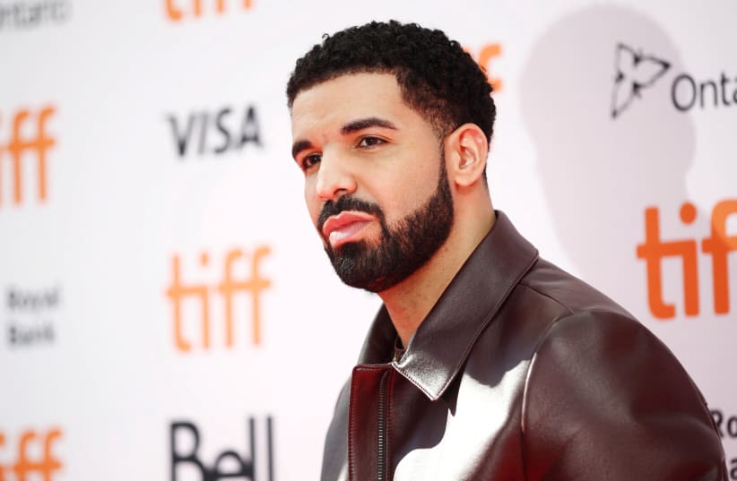  Rapper Drake arrives on the red carpet for the film "The Carter Effect" at the Toronto International Film Festival (TIFF), in Toronto, Canada, September 9, 2017.  (photo credit: REUTERS/MARK BLINCH)