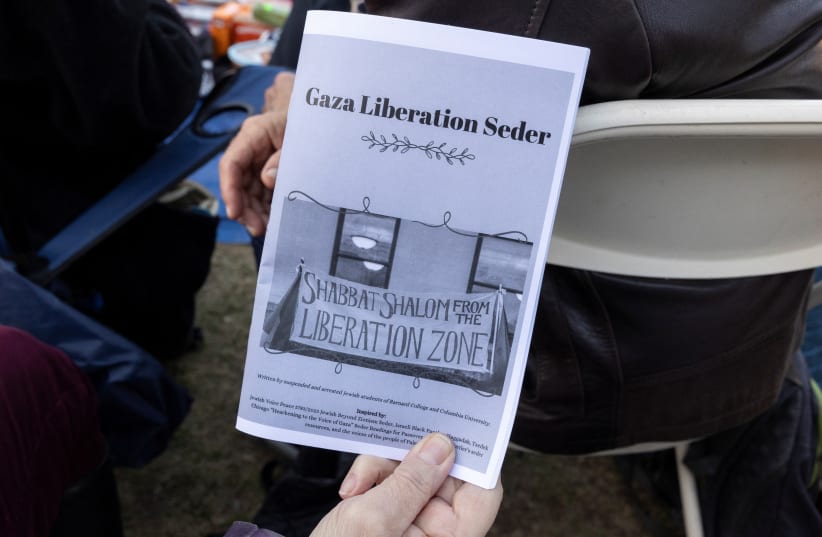  A collective of groups organised by Jewish students at Columbia and Barnard in solidarity with Gaza and the protest encampment host Passover Seder at Columbia University, during the ongoing conflict between Israel and the Palestinian Islamist group Hamas, in New York City, U.S., April 22, 2024. (photo credit: REUTERS/CAITLIN OCHS)