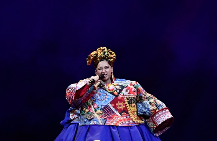  Participant Manizha of Russia performs during the final of the 2021 Eurovision Song Contest in Rotterdam, Netherlands, May 22, 2021.  (photo credit: REUTERS/PIROSCHKA VAN DE WOUW/FILE PHOTO)