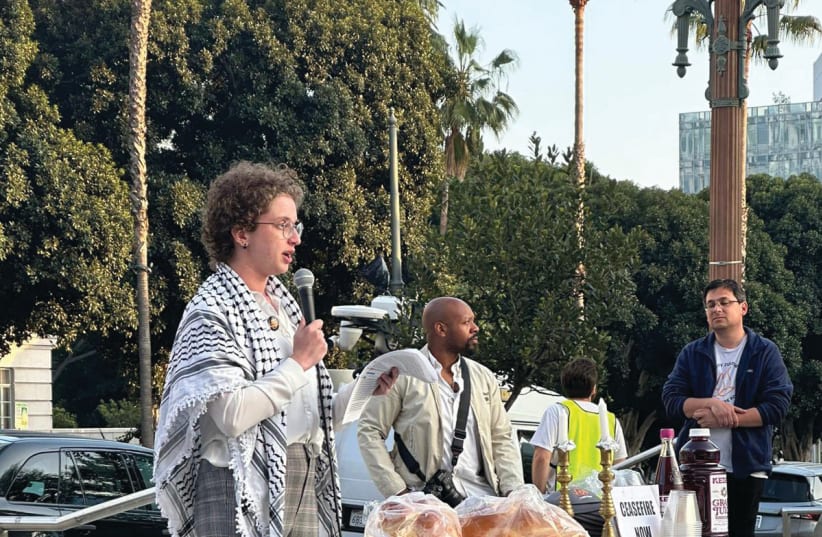 A USC alumnus and member of IfNotNow’s Los Angeles branch, identified as ‘Jay,’ is quoted as stating last Friday: ‘I am proud to be here tonight, bringing in Shabbat in solidarity with the student divestment movement and in solidarity with Palestine.’ (photo credit: If not now/X)