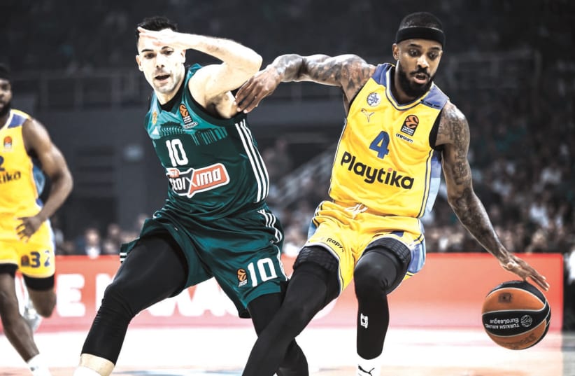  LORENZO BROWN (right) and Maccabi Tel Aviv fought valiantly, but came up just short to Kostas Sloukas (left) and Panathinaikos, falling 81-72 in Athens late Tuesday night in the decisive Game 5 of their Euroleague quarterfinal series. (photo credit: Dimitropoulos/Tourette Photography)