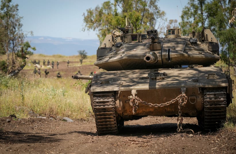 Israeli reserve soldiers take part in a military drill in the Golan Heights, northern Israel, May 8, 2024 (photo credit: AYAL MARGOLIN/FLASH90)
