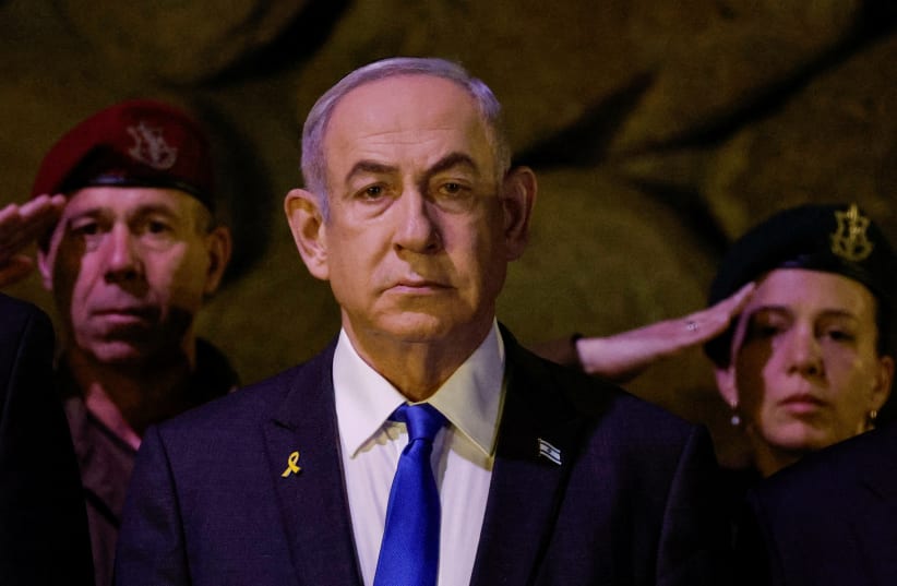  Israeli Prime Minister Benjamin Netanyahu attends a wreath-laying ceremony marking Holocaust Remembrance Day in the Hall of Remembrance at Yad Vashem, the World Holocaust Remembrance Centre, in Jerusalem, May 6, 2024.  (photo credit: REUTERS/Amir Cohen/Pool/File Photo)
