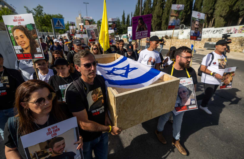  Relatives of Israelis held hostage by Hamas terrorists in Gaza protest march for their release near the Knesset, the Israeli Parliament in Jerusalem, May 9, 2024. (photo credit: YONATAN SINDEL/FLASH90)